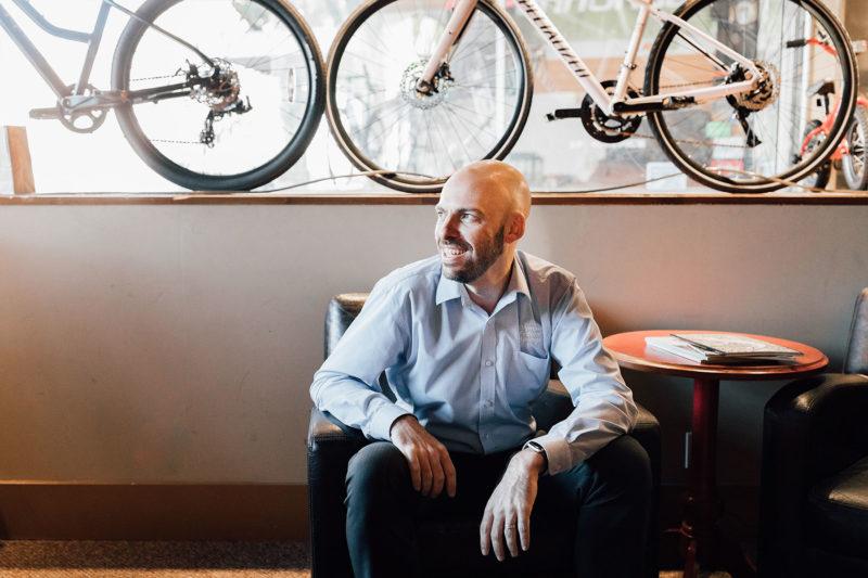 Mike Bowen looking at bikes at a local bike shop