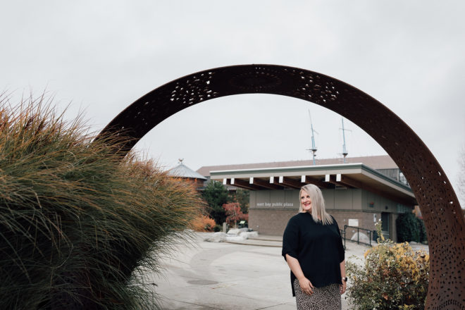 OlyFed Loan Officer, Melissa Kirkeby, in front of the Hands on Children's Museum in downtown Olympia, Washington.