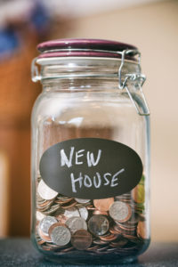 Jar of change for saving for a new home