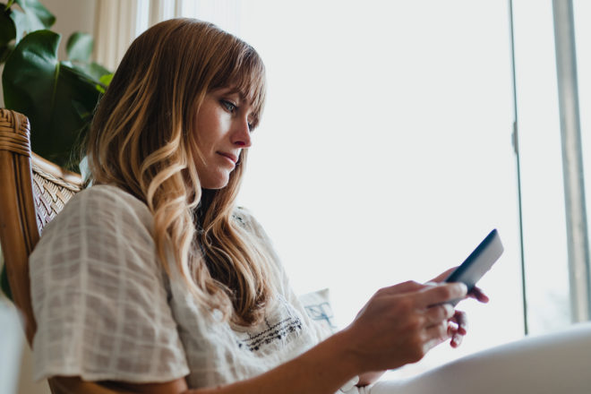 Woman holding a digital tablet