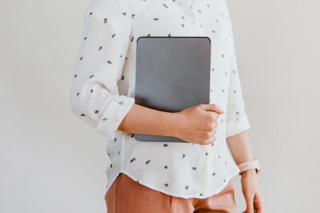 Woman holding a digital tablet