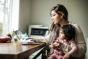 Mom with child on computer