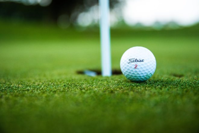 A golf ball on the green