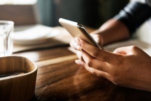 Person holding a cell phone