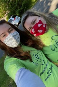 Kailee and Nicole volunteering in the community