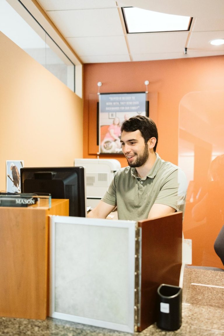 Mason in the Tumwater branch helping a customer