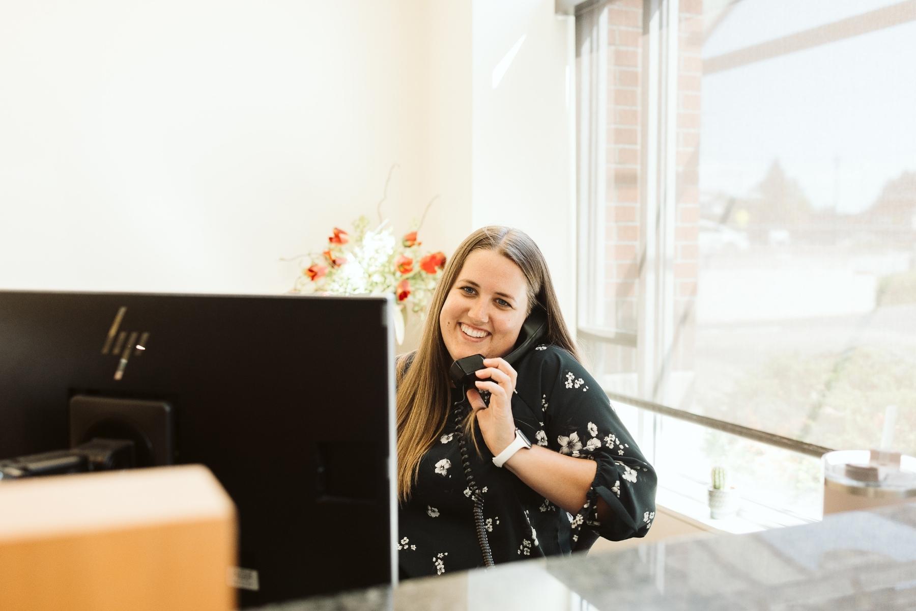 Hannah in the Tumwater branch helping a customer