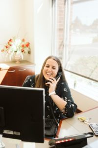 Hannah in the Tumwater branch helping a customer