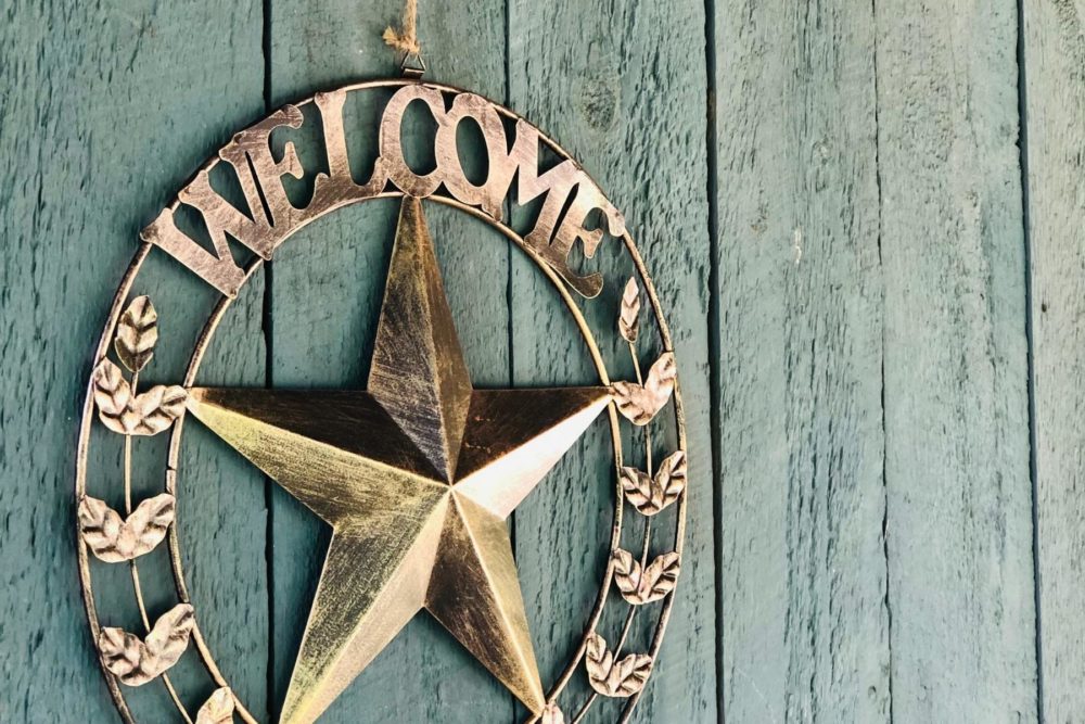 Welcome Sign at a home with a star emblem