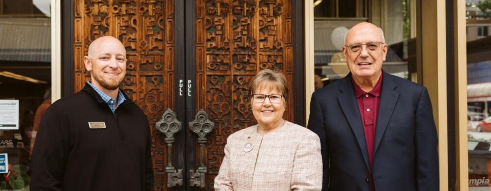 Wayne, Josh and Lori in front of OlyFed's main branch in downtown Olympia, Washington