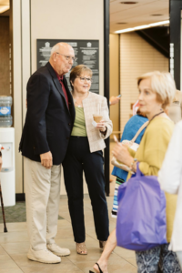 Past presidents of Olympia Federal Savings, Wayne Staley and Lori Drummond.