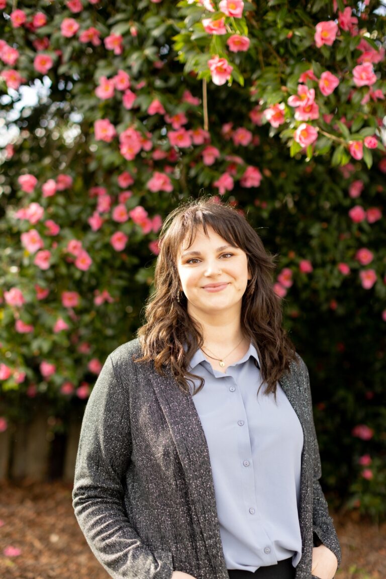 Isabella Marocco by a flowering tree