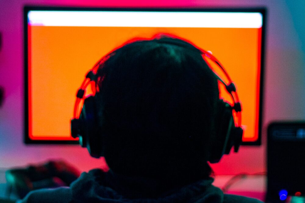 Person on bright colorful computer screen
