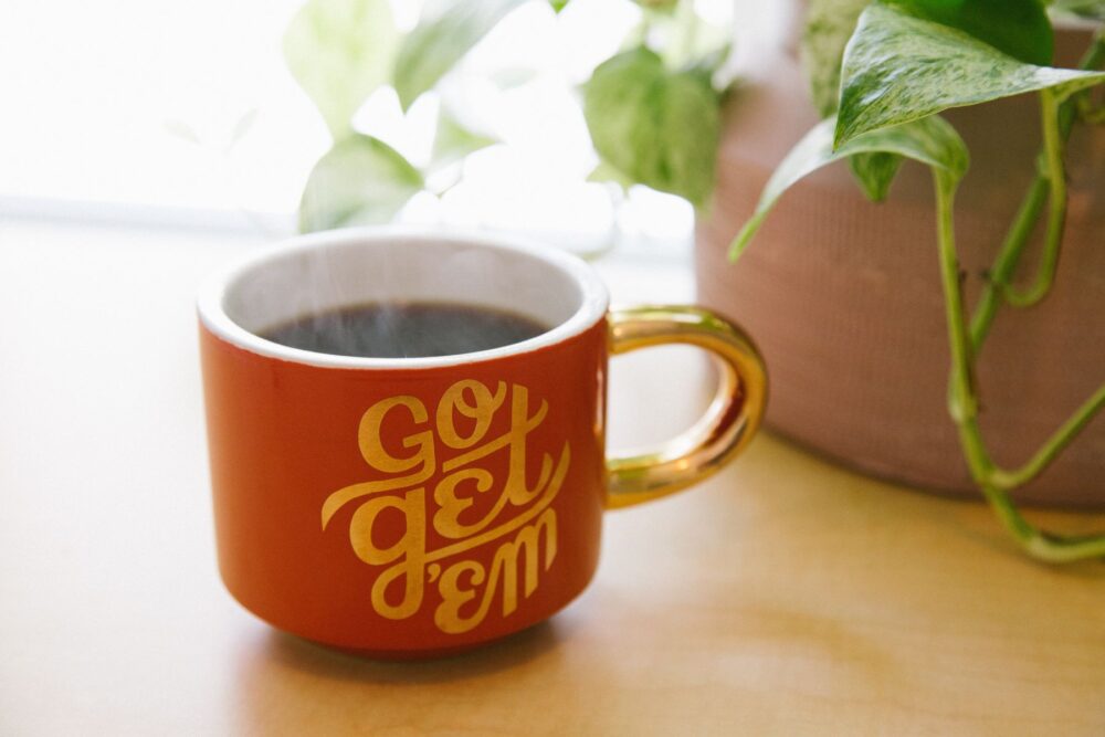 Coffee mug that says "go get 'em"