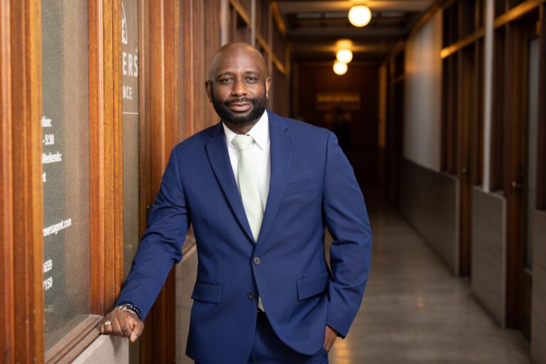 Banker in hallway wearing a suit