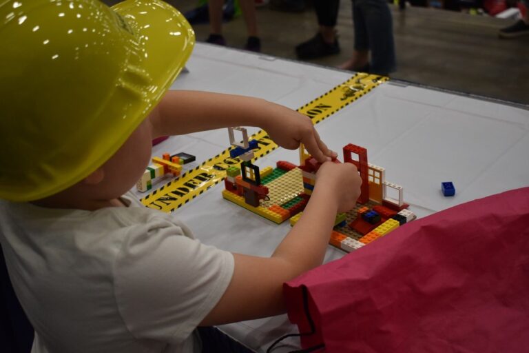 kid playing with legos