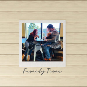 Man, woman and child at breakfast