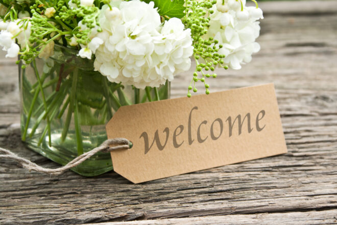 A sign that reads welcome