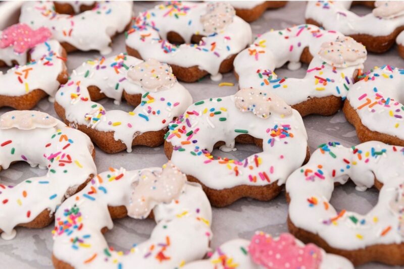 Donuts with white frosting and sprinkles
