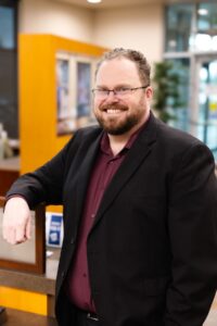 Man standing in the lobby of a bank