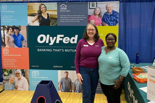 OlyFed employees at OMB Home Show booth