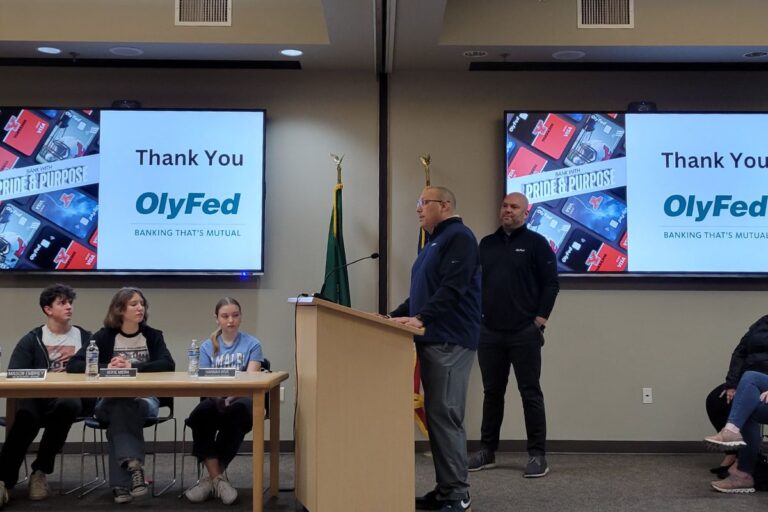 Ryan Betz speaks at podium during YCS Board meeting