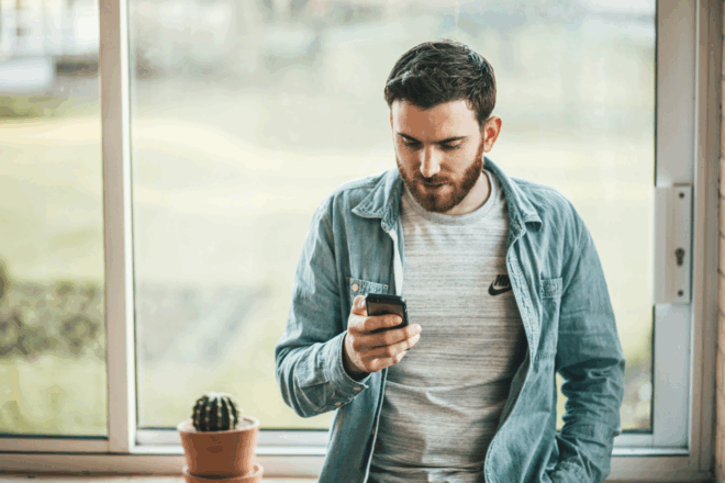 Man holding a phone in his hand.