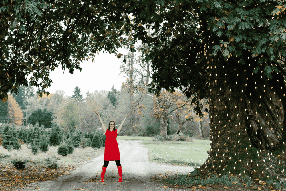 OlyFedder in front of a holiday tree