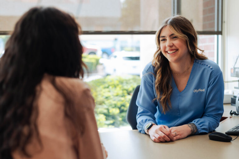 Emily Gutierrez Business Banker talking with client.